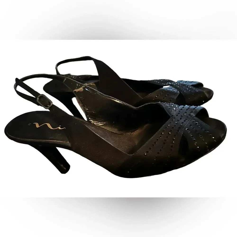 Mia black peep toe heel with sparkle.